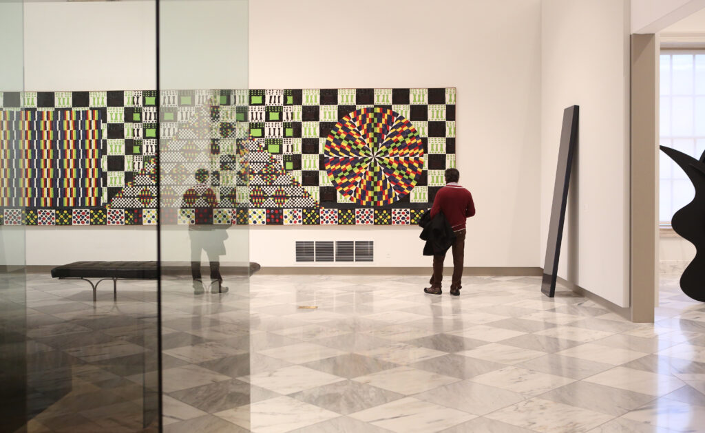 man in contemporary art gallery